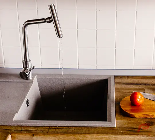 image of installed modern sink with special faucet on delta p plumbing